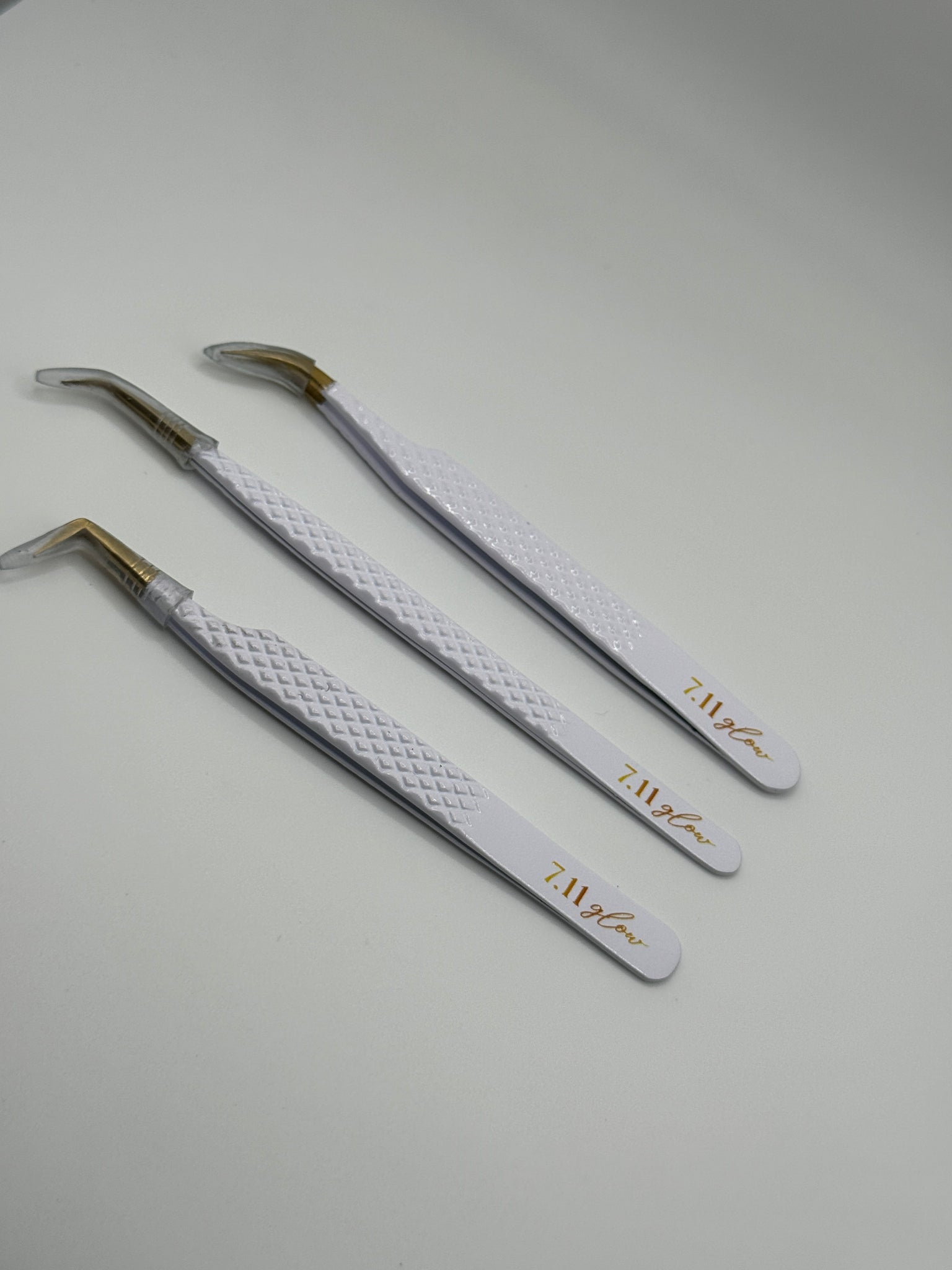 White lash tweezers